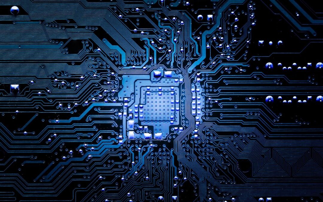 Close-up view of a blue illuminated circuit board with intricate pathways and components, symbolizing technology and electronics.